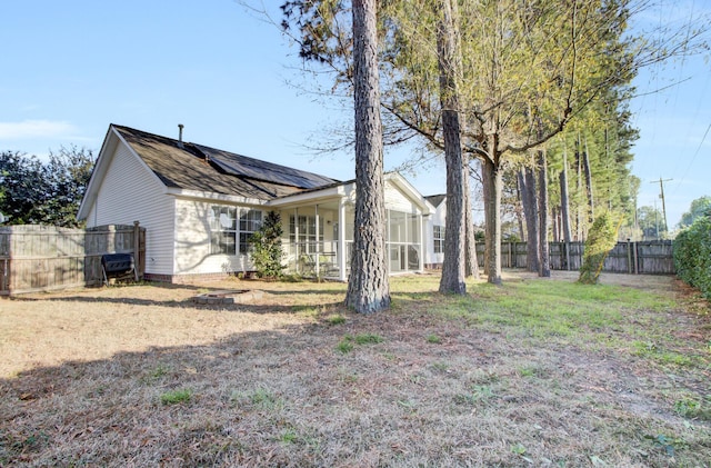 exterior space featuring a fenced backyard