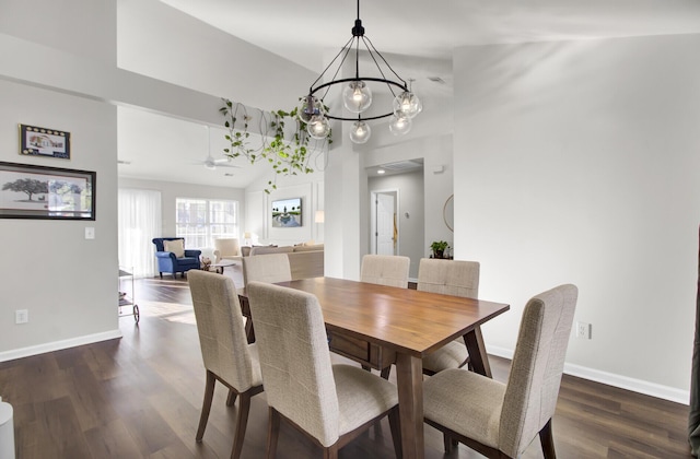 dining area with dark wood-style floors, ceiling fan, and baseboards