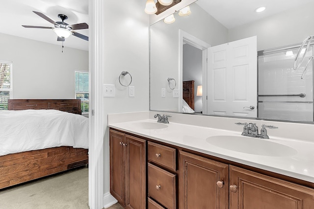 bathroom featuring ceiling fan and vanity