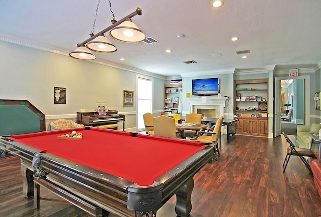 recreation room featuring billiards, dark hardwood / wood-style floors, and crown molding