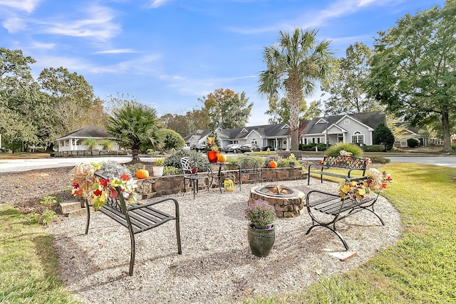 view of patio with an outdoor fire pit