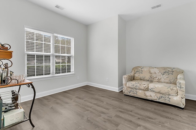 sitting room featuring hardwood / wood-style flooring