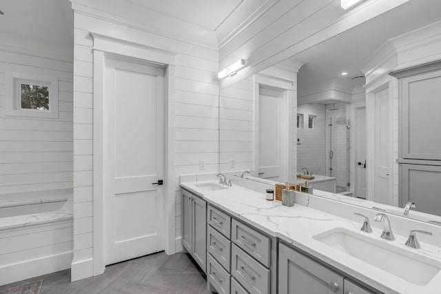 bathroom featuring dual vanity, tile flooring, and crown molding