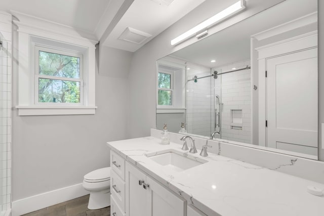 bathroom featuring oversized vanity and toilet