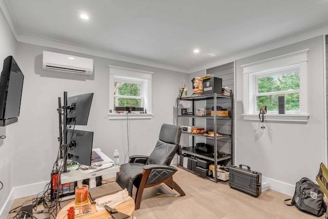 home office with light hardwood / wood-style floors, ornamental molding, and an AC wall unit