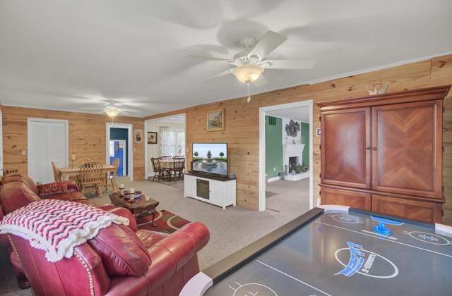 carpeted living room with a textured ceiling and crown molding