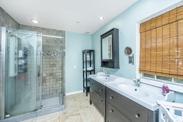 2650 Summer Leaves Ct, Charleston, SC 29414 - full bath featuring two vanities, a shower stall, tile patterned floors, and recessed lighting