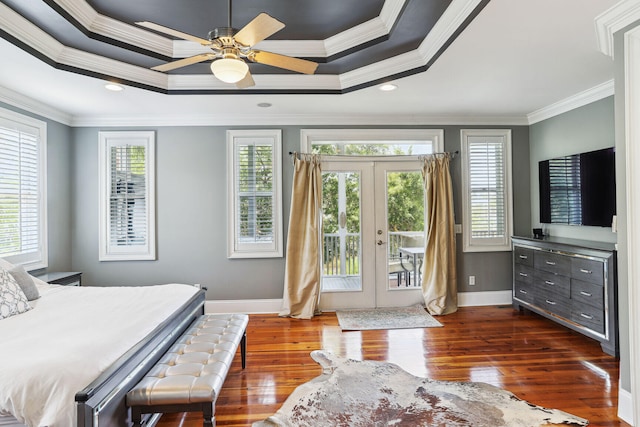 bedroom featuring ceiling fan, access to exterior, french doors, and multiple windows