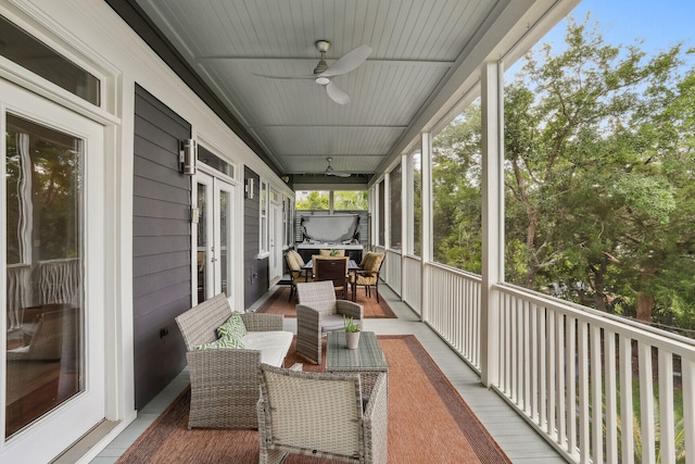 sunroom / solarium with ceiling fan