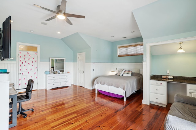 bedroom featuring vaulted ceiling, ceiling fan, and dark hardwood / wood-style floors