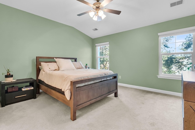 carpeted bedroom featuring ceiling fan and lofted ceiling