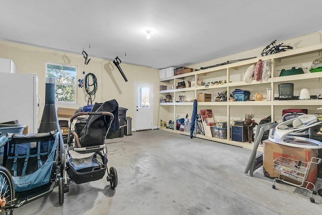 garage with white fridge