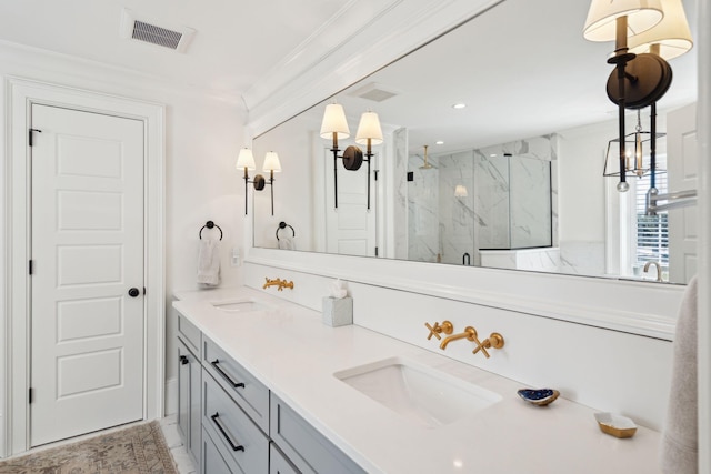 bathroom with an enclosed shower, vanity, and crown molding