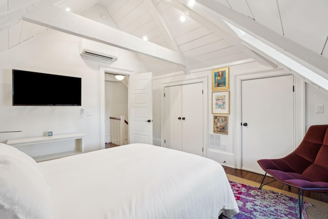 bedroom with hardwood / wood-style flooring, a wall mounted air conditioner, lofted ceiling with beams, and wooden ceiling