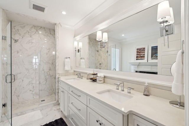 bathroom with ornamental molding, an enclosed shower, and vanity