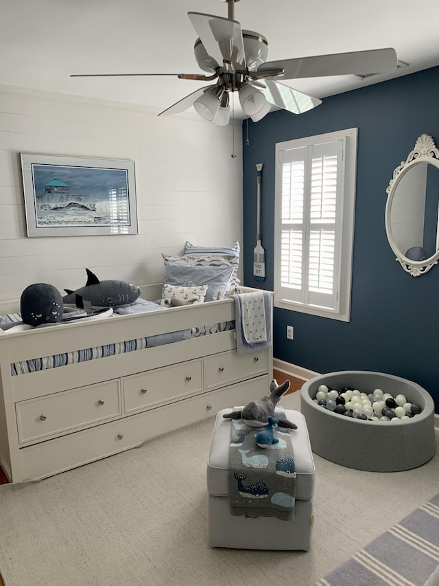 bedroom with ceiling fan and carpet