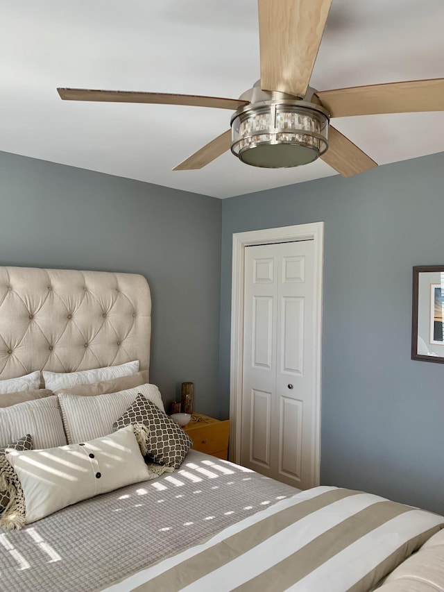 bedroom featuring a closet and ceiling fan