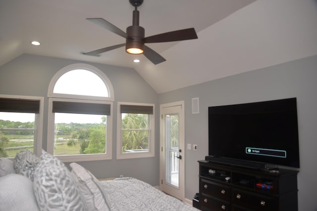 bedroom featuring ceiling fan, lofted ceiling, and access to exterior