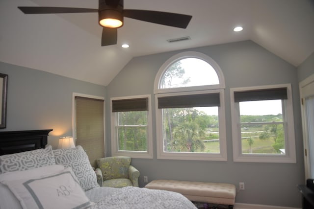 bedroom featuring ceiling fan and lofted ceiling