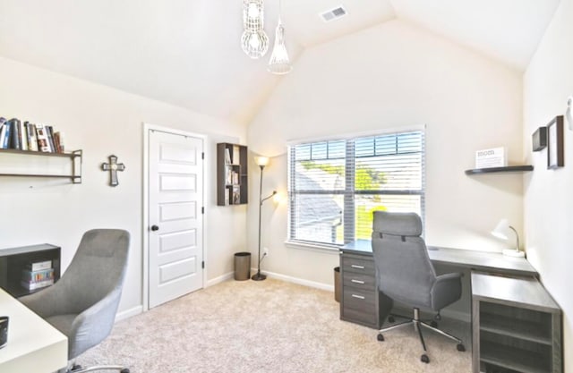 carpeted home office featuring high vaulted ceiling