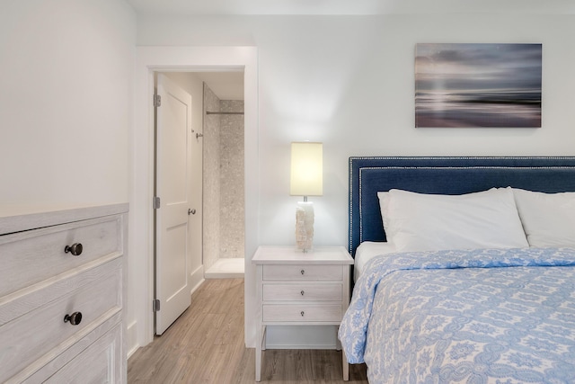 bedroom with light wood-style floors