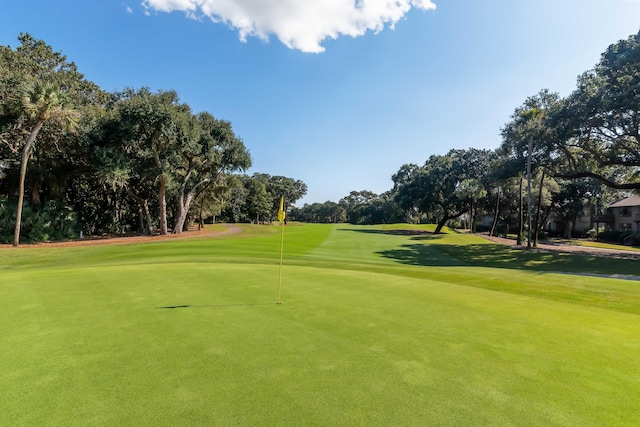 view of community featuring view of golf course