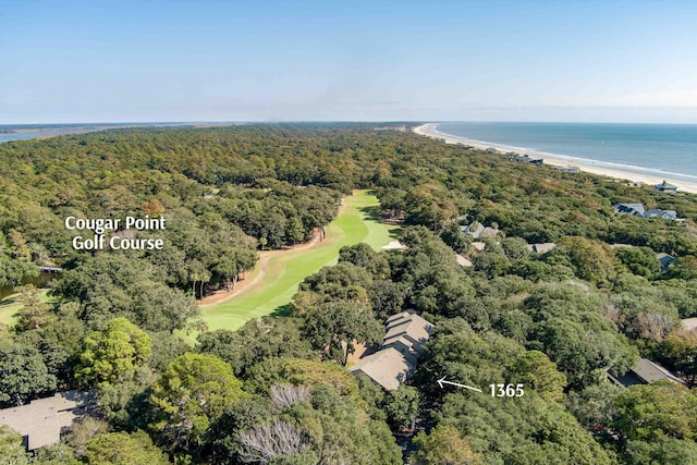 aerial view featuring view of golf course, a water view, and a forest view