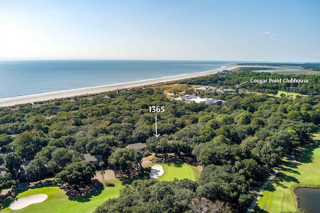 bird's eye view with view of golf course and a water view