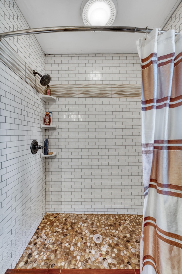 bathroom featuring walk in shower