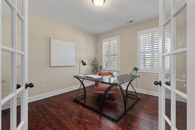 office area with french doors, baseboards, visible vents, and hardwood / wood-style flooring