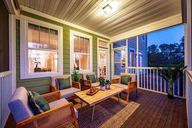 wooden terrace featuring a porch