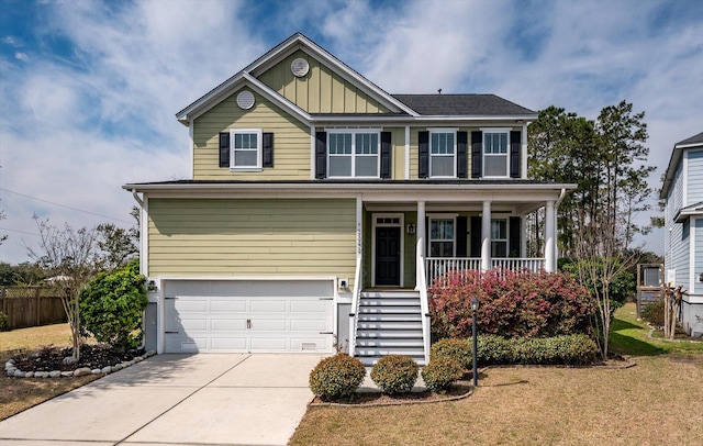 view of front of property with fence, a porch, an attached garage, concrete driveway, and board and batten siding