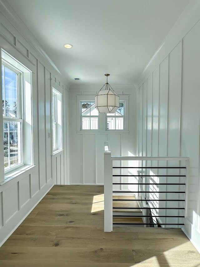 interior space featuring a healthy amount of sunlight and wood-type flooring