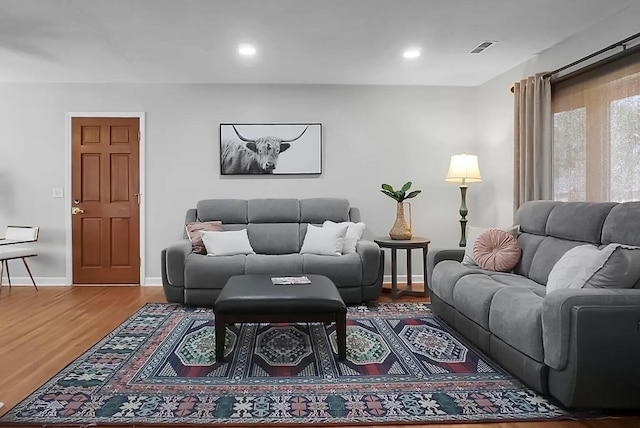 1113 Smithfield Pl, Hanahan, SC 29410 - living room with recessed lighting, visible vents, baseboards, and wood finished floors