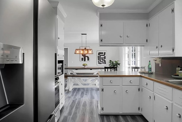 1113 Smithfield Pl, Hanahan, SC 29410 - kitchen with ornamental molding, white cabinets, appliances with stainless steel finishes, and wood finished floors