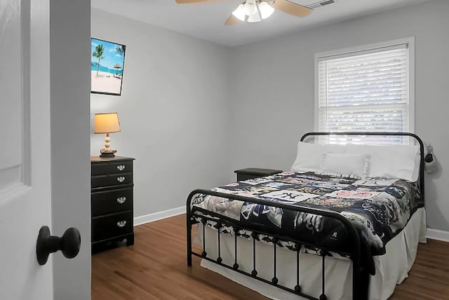 1113 Smithfield Pl, Hanahan, SC 29410 - bedroom featuring baseboards, ceiling fan, and wood finished floors