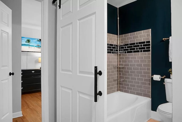 1113 Smithfield Pl, Hanahan, SC 29410 - bathroom with toilet, baseboards, wood finished floors, and shower / bathtub combination