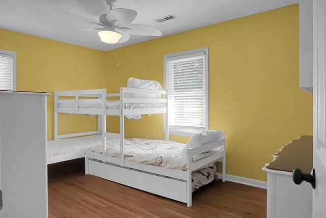 1113 Smithfield Pl, Hanahan, SC 29410 - unfurnished bedroom featuring visible vents, baseboards, a ceiling fan, and wood finished floors
