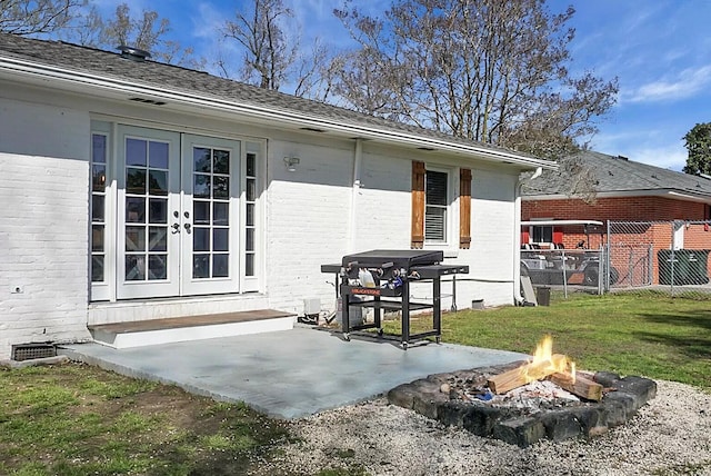 1113 Smithfield Pl, Hanahan, SC 29410 - rear view of property featuring an outdoor fire pit, french doors, a patio area, and brick siding