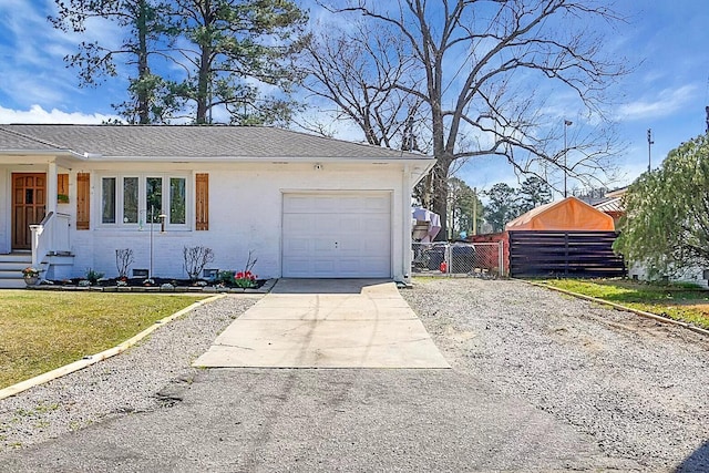 1113 Smithfield Pl, Hanahan, SC 29410 - exterior space with driveway, brick siding, a garage, a yard, and fence