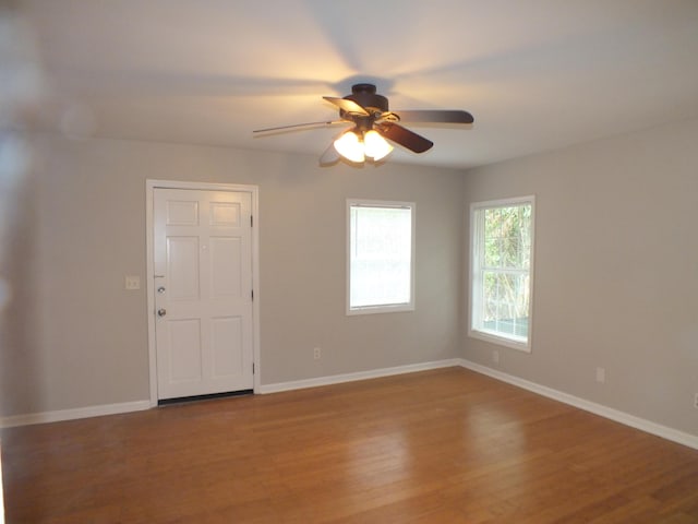 418 Meritta Ave, Beaufort, SC 29902 - unfurnished room featuring a ceiling fan, wood finished floors, and baseboards