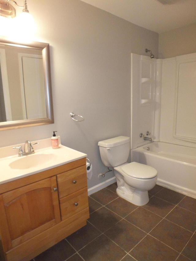 418 Meritta Ave, Beaufort, SC 29902 - full bathroom with toilet, vanity, washtub / shower combination, tile patterned floors, and baseboards