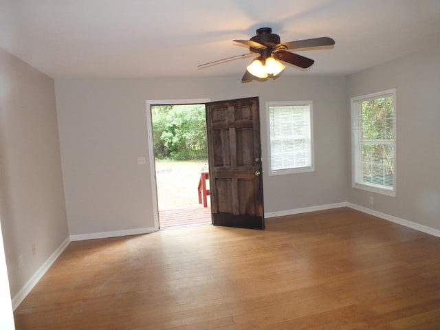 418 Meritta Ave, Beaufort, SC 29902 - empty room featuring healthy amount of natural light, light wood-type flooring, and a ceiling fan