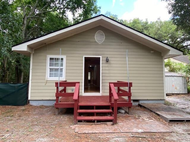 418 Meritta Ave, Beaufort, SC 29902 - rear view of property with a deck and an outdoor structure