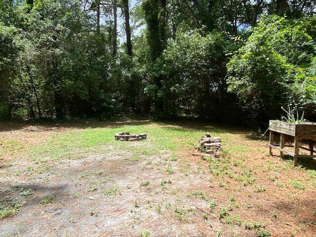418 Meritta Ave, Beaufort, SC 29902 - view of yard featuring an outdoor fire pit