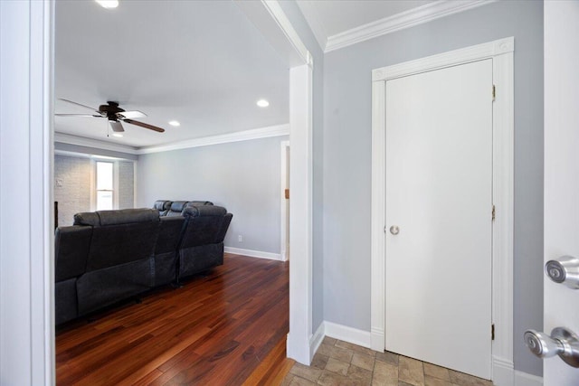 living area featuring baseboards, ceiling fan, ornamental molding, recessed lighting, and wood finished floors