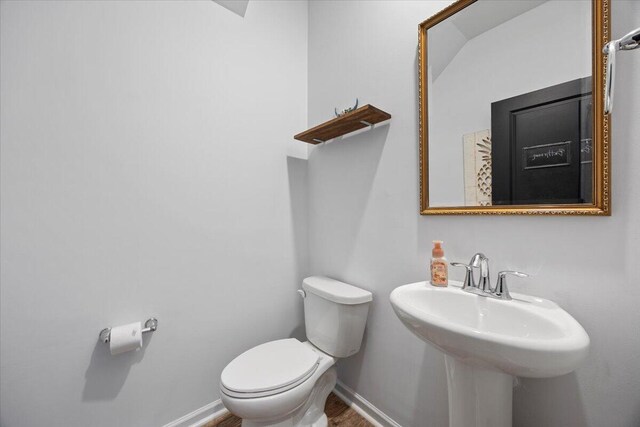 707 Redbud Ln, Summerville, SC 29486 - half bath featuring baseboards, toilet, and a sink