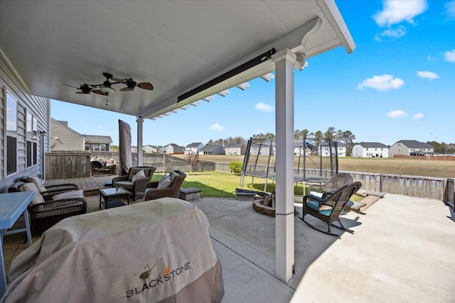 707 Redbud Ln, Summerville, SC 29486 - view of patio / terrace with a trampoline, a fenced backyard, a residential view, an outdoor hangout area, and ceiling fan