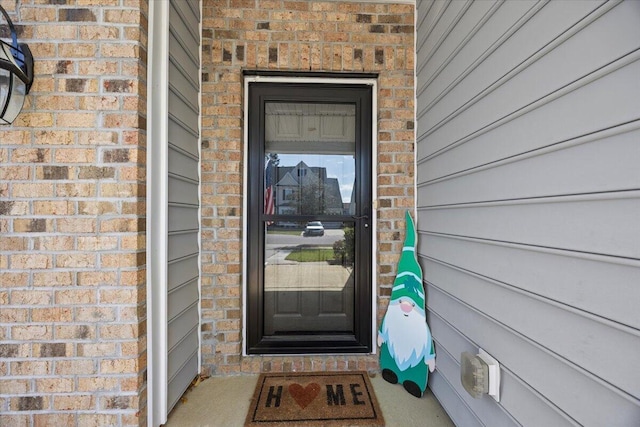 707 Redbud Ln, Summerville, SC 29486 - doorway to property featuring brick siding