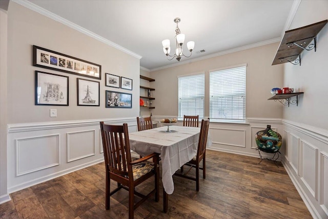 707 Redbud Ln, Summerville, SC 29486 - dining room featuring a wainscoted wall, a notable chandelier, crown molding, and dark wood finished floors